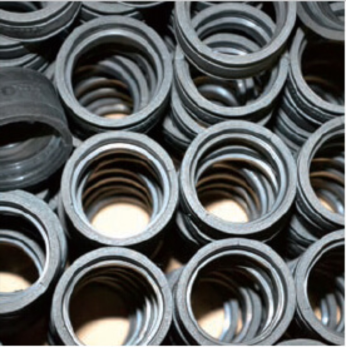 Stacked rings of rubber and metal